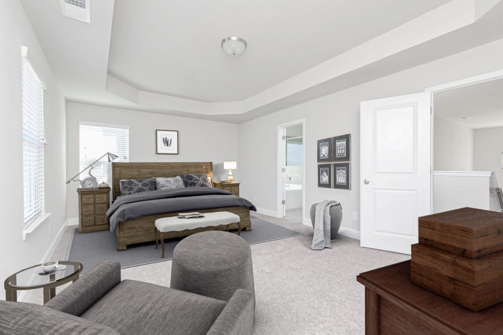 A bedroom in the Chesney Plan Killian Manor at The Adares