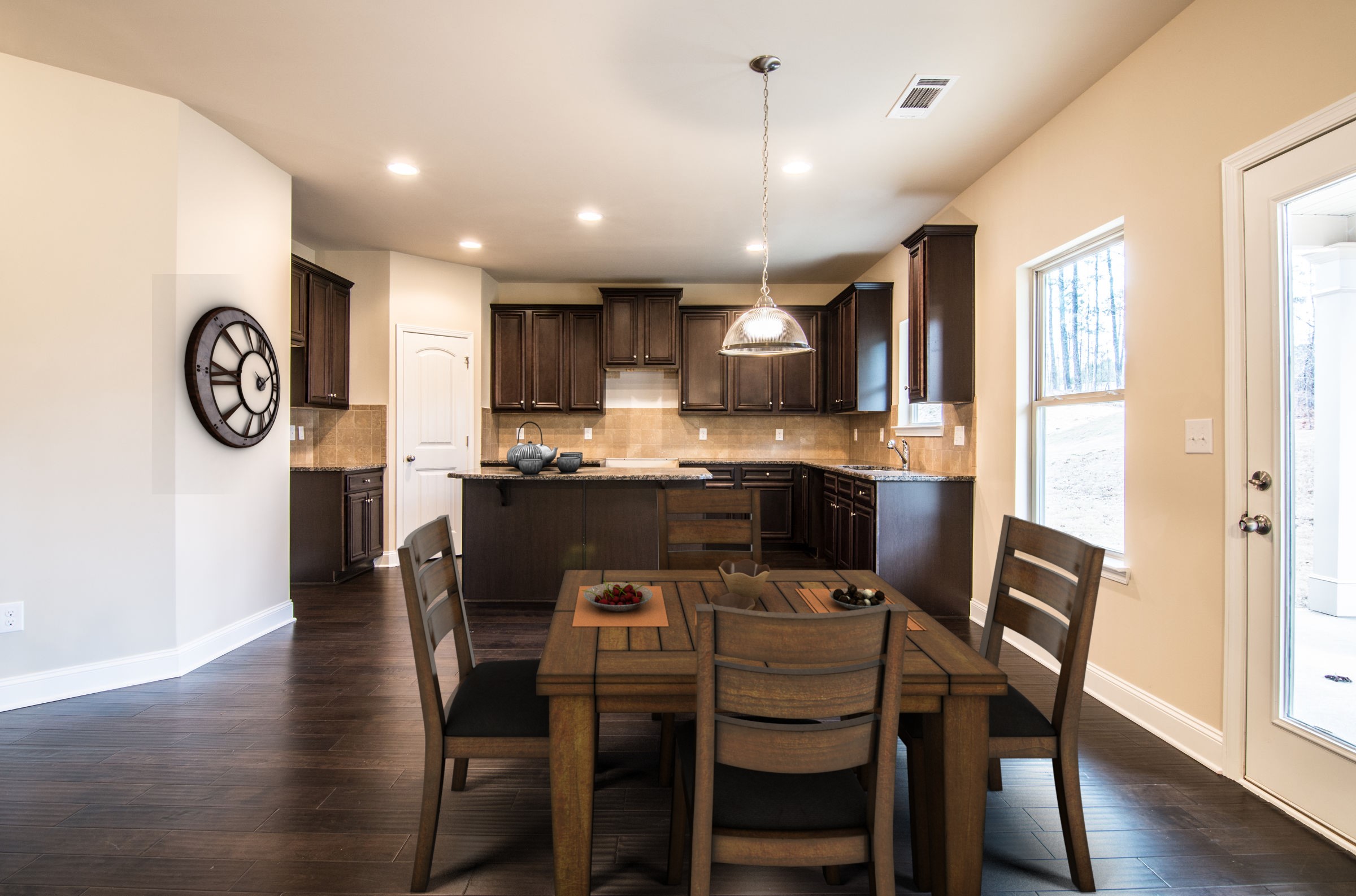 A fully decorated kitchen in a new construction home in Fairburn, GA.