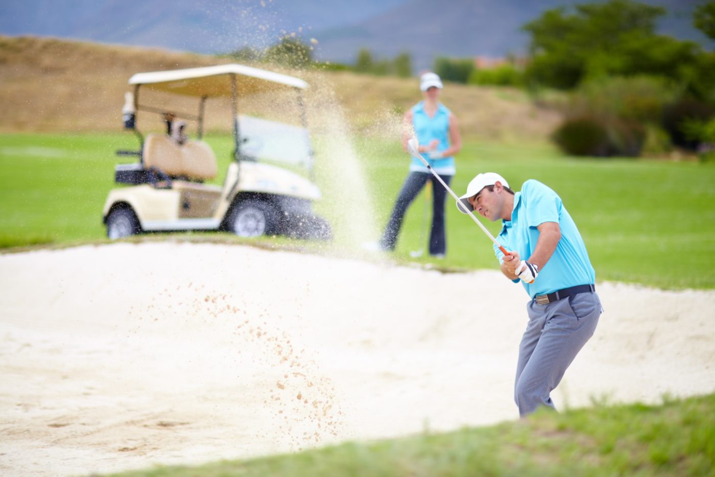 People playing golf ©YuriArcursPeopleimages