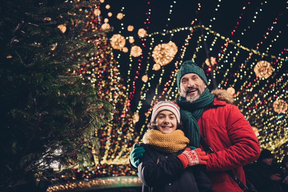Family viewing holiday lights ©Roman Samborskyi