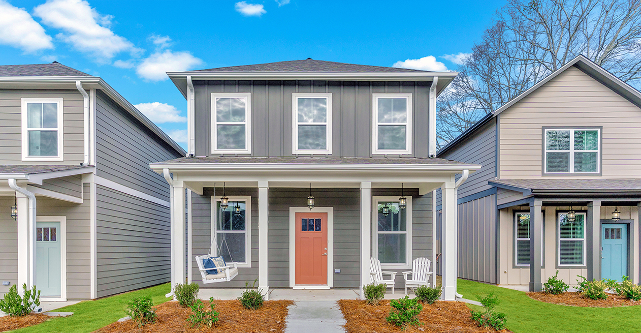 Christine Plan tiny cottage at The Cottages at East Lanier in Fayetteville, GA, with covered front porch and front yard.