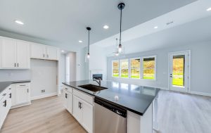 Open-concept kitchen in a new Peachwood floor plan home