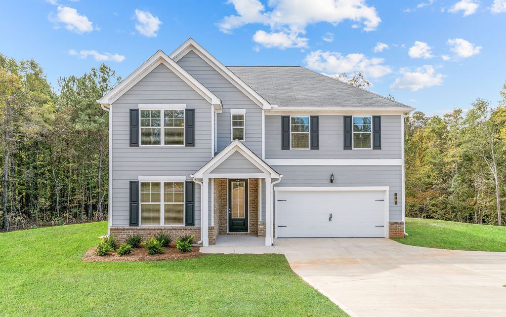 New construction Mansfield homes for sale with spacious yards at Waters Edge.