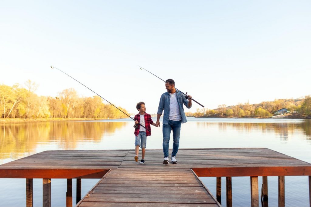 Father and son fishing near Waters Edge community in Mansfield, GA. ©Bohdan Malitskiy