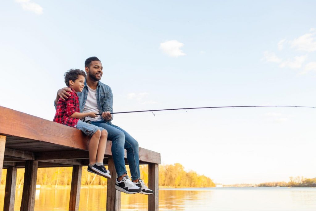 Father and son fishing from a dock near their new home in Hartwell, GA.
©Bohdan Malitskiy