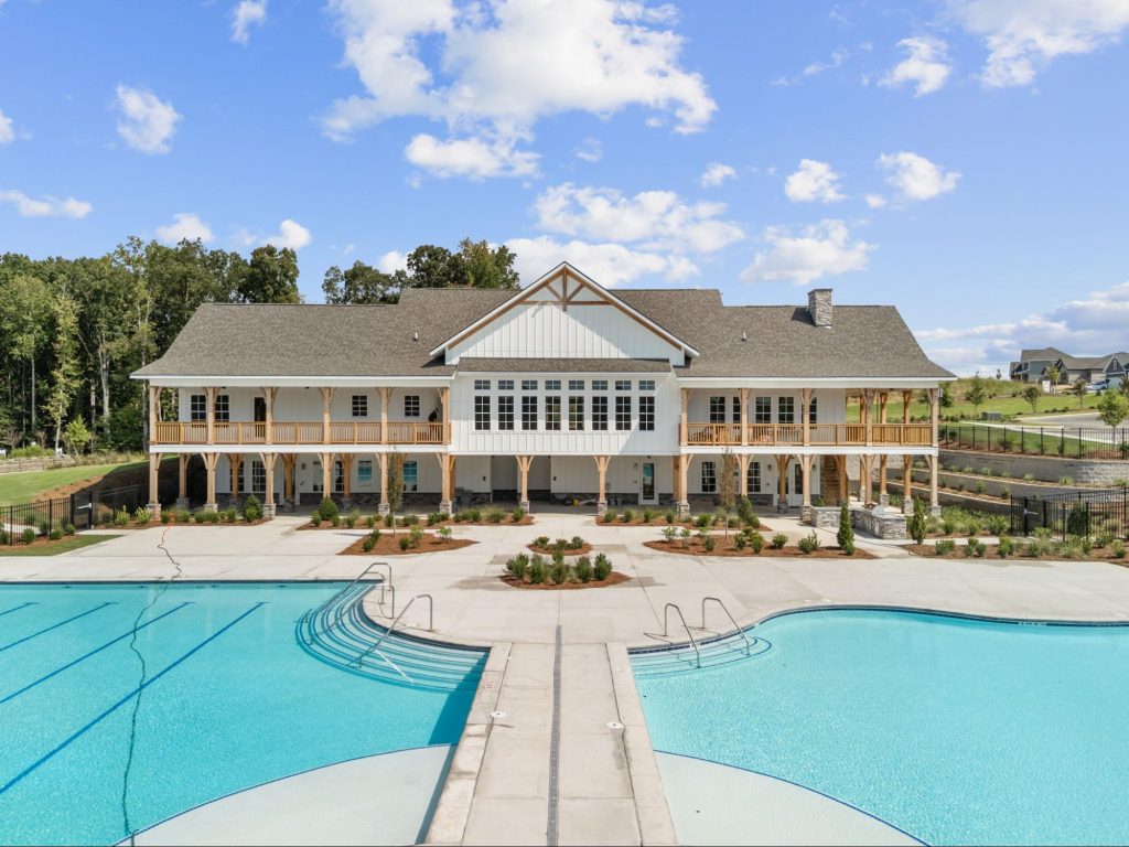 The community clubhouse and swimming pool area at Gainesville Township, A master-planned community in Gainesville, GA.