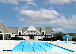 The Jr. Olympic swimming pool and surrounding deck at Chimney Oaks