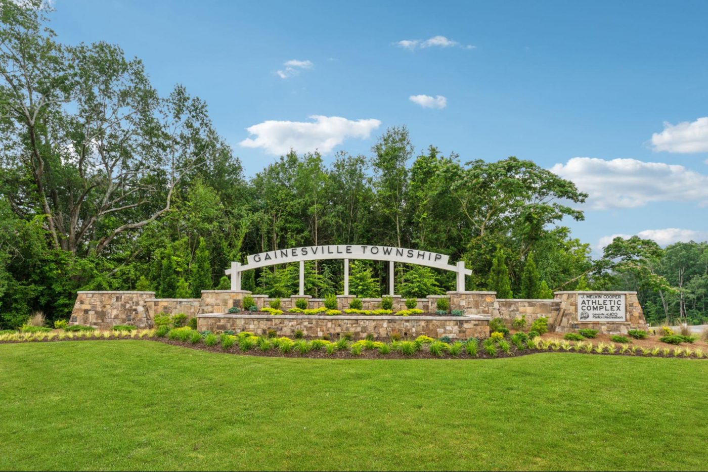 Stone entrance monument sign for Gainesville Township, a new master-planned community in Gainesville, Georgia.