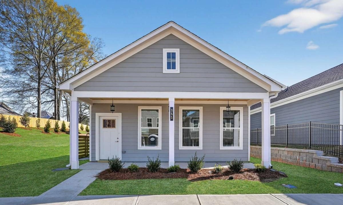 gray ranch house in community