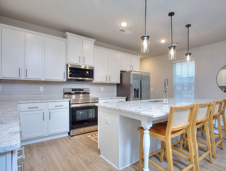 Stone Brooke Kitchen with lots of counter space and island.
